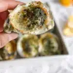 Delicious garlic herb butter grilled oysters on the grill