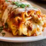 Delicious homemade lasagna roll ups filled with cheese and herbs