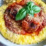 Delicious meatballs served with creamy polenta in a rustic presentation