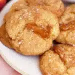 Freshly baked peach cookies with golden edges and peach pieces