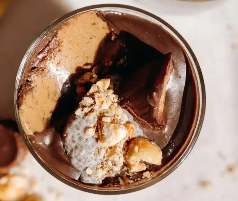 Peanut Butter Cup Chia Pudding with banana and cacao nibs in a bowl