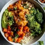 Peanut Sweet Potato Buddha Bowl filled with fresh veggies and peanut sauce