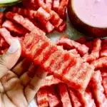 Deliciously served watermelon fries garnished with mint leaves