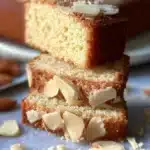 Delicious homemade Almond Flour Cake sliced on a wooden board