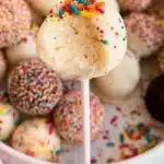 Colorful cake pops arranged on a platter for a festive celebration