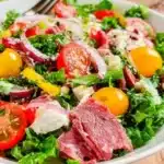 Chopped Italian Salad with colorful vegetables and dressing