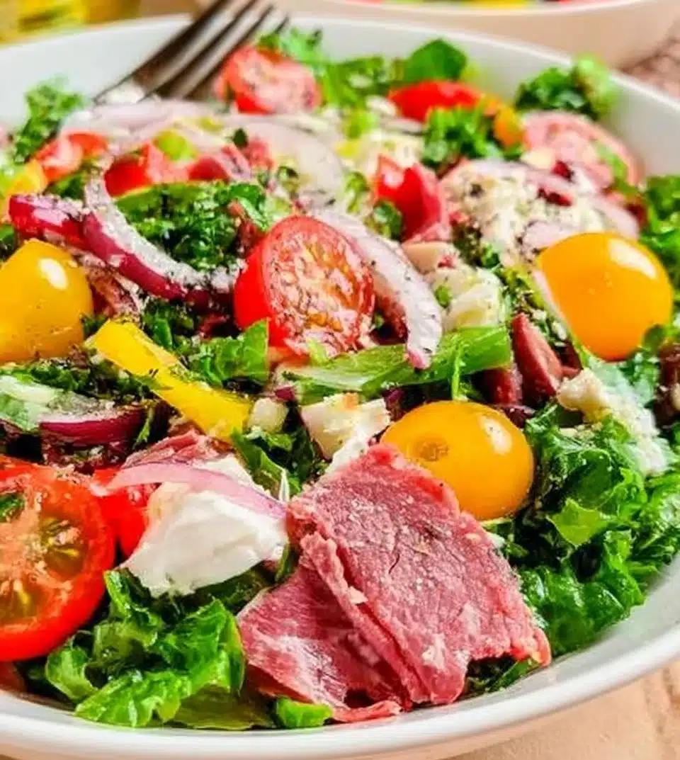 Chopped Italian Salad with colorful vegetables and dressing