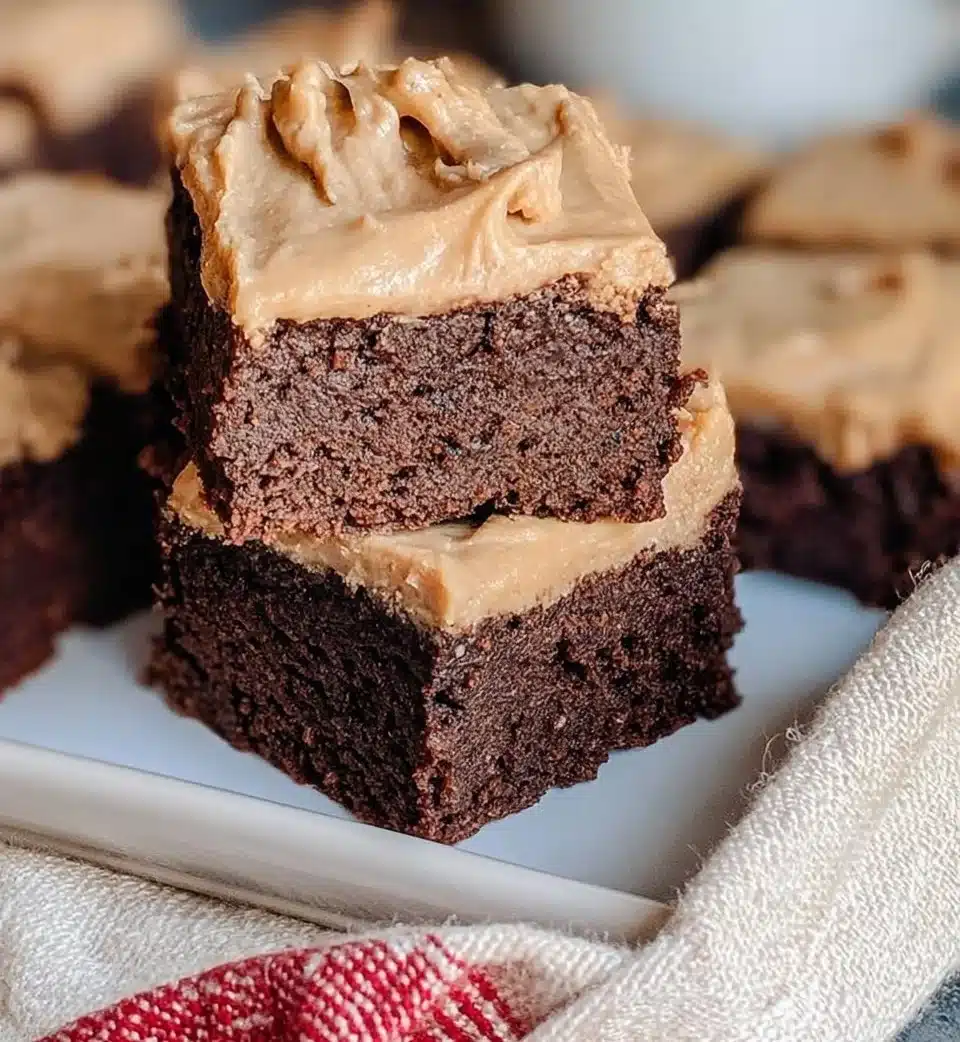 Decadent coffee brownies topped with chocolate and coffee flavors.