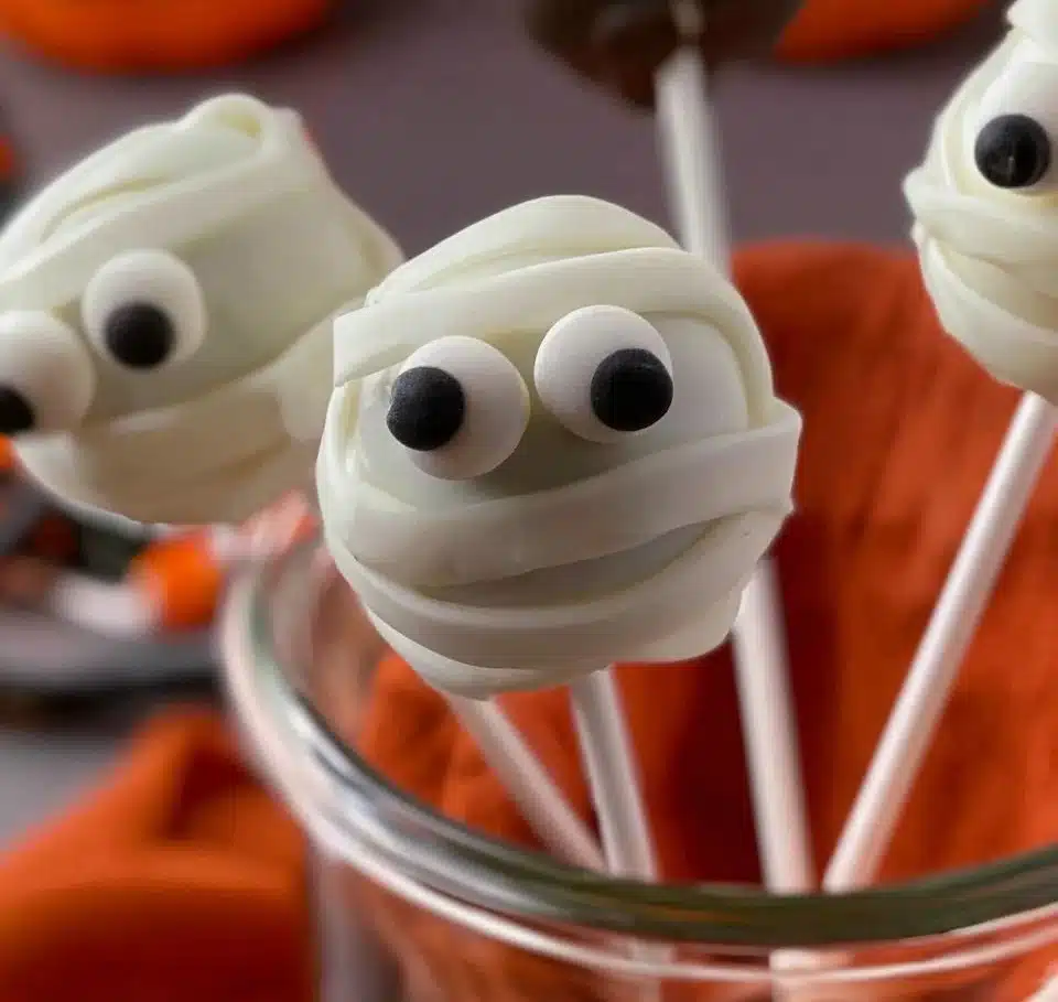 Festive Halloween cake pops decorated for spooky celebrations