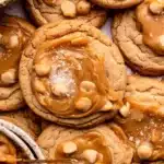 Freshly baked Harry Potter Butterbeer Cookies on a wooden table.