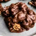 Delicious peanut clusters made with peanuts and chocolate.