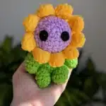 A vibrant flower baby illustration featuring colorful blossoms and greenery.
