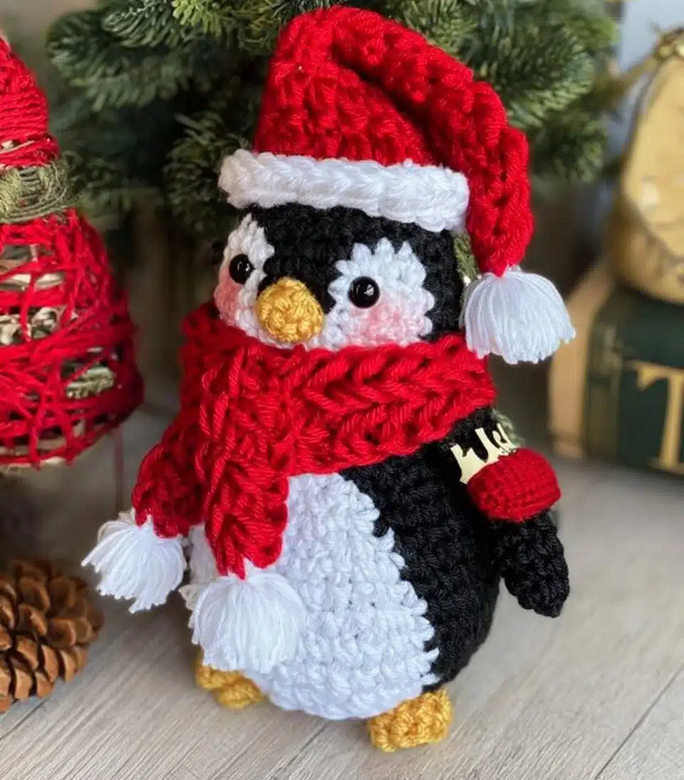 Santa Penguin dressed in festive attire spreading holiday cheer.
